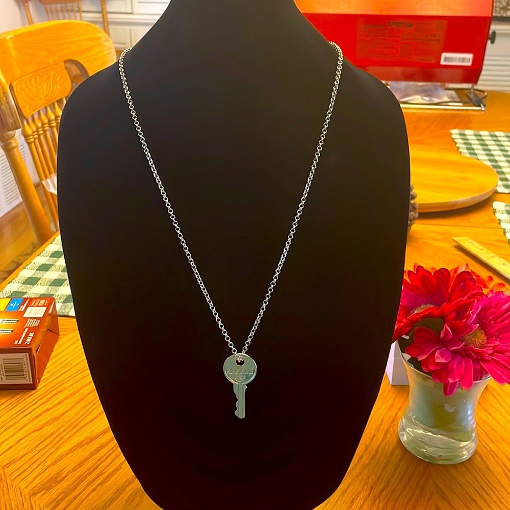 ⭐️⭐️FREE with purchase!! Silver Dog Rescue necklace. The chain is 30” long. New!